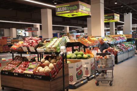 Customers shop at an Aldi grocery store in Chicago, Illinois